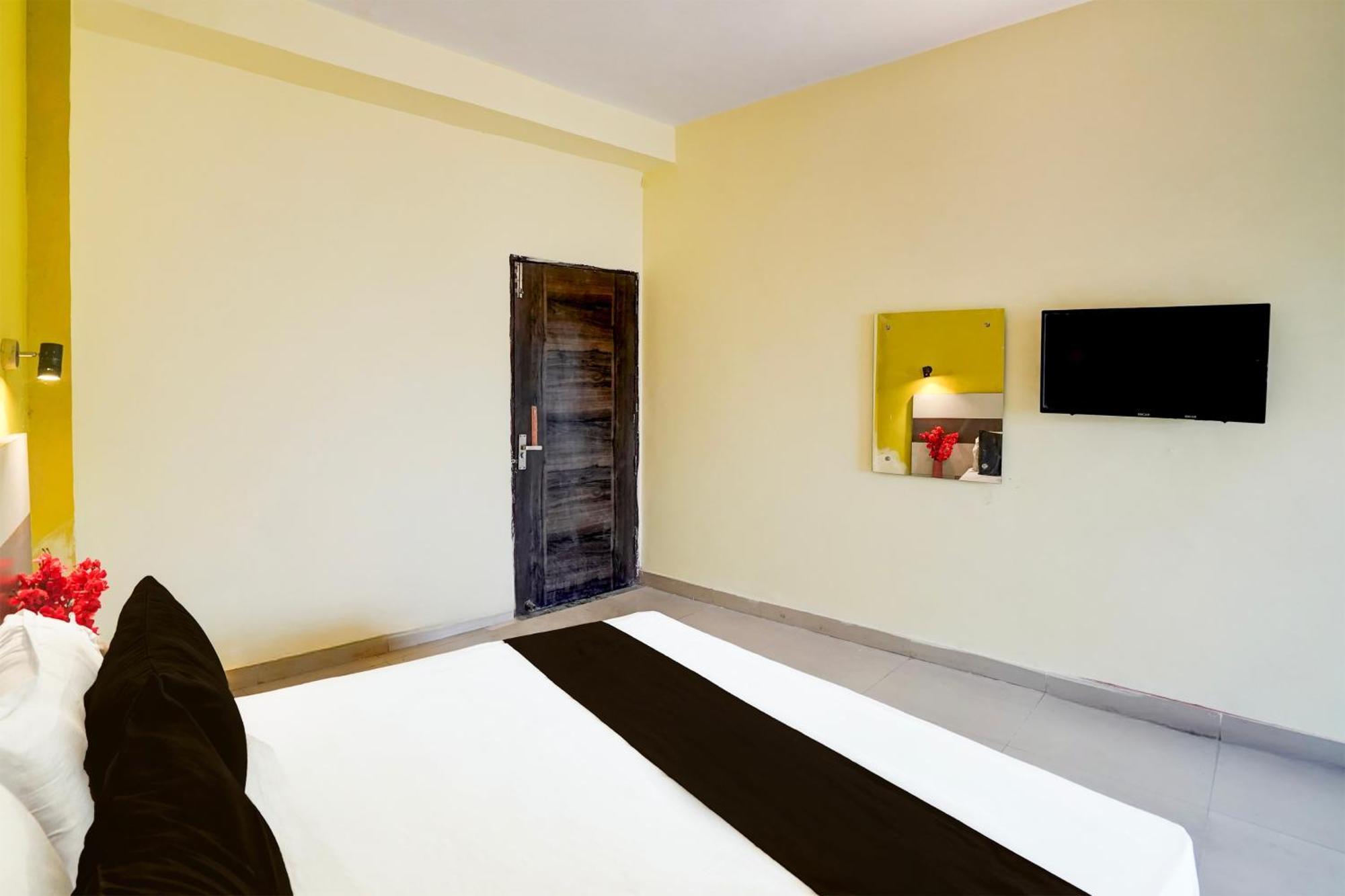 Hotel O Vishkarma Colony Formerly Harmony Palace New Delhi